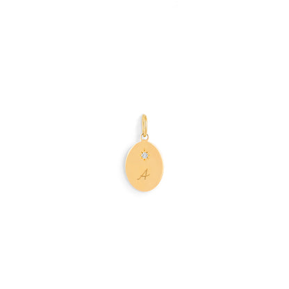Pendentif médaille ovale femme en or jaune 18 carats avec diamant